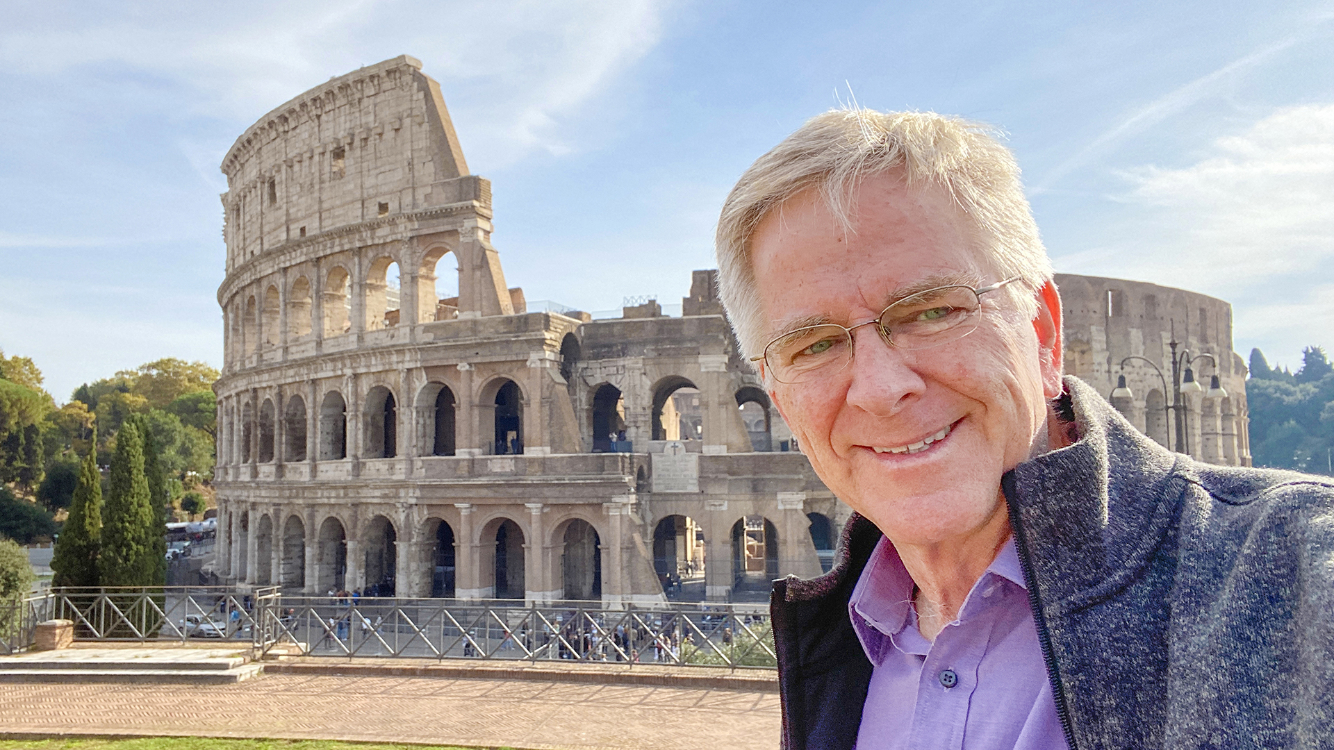 Rick Steves outside of Rome’s Colosseum (ad 80). Photo: Rick Steves’ Europe.